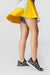 ladetennis.lucy.yellow.mustard.skirts.womens.tennis.active.clothing