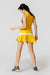 ladetennis.lucy.yellow.mustard.skirts.womens.tennis.active.clothing